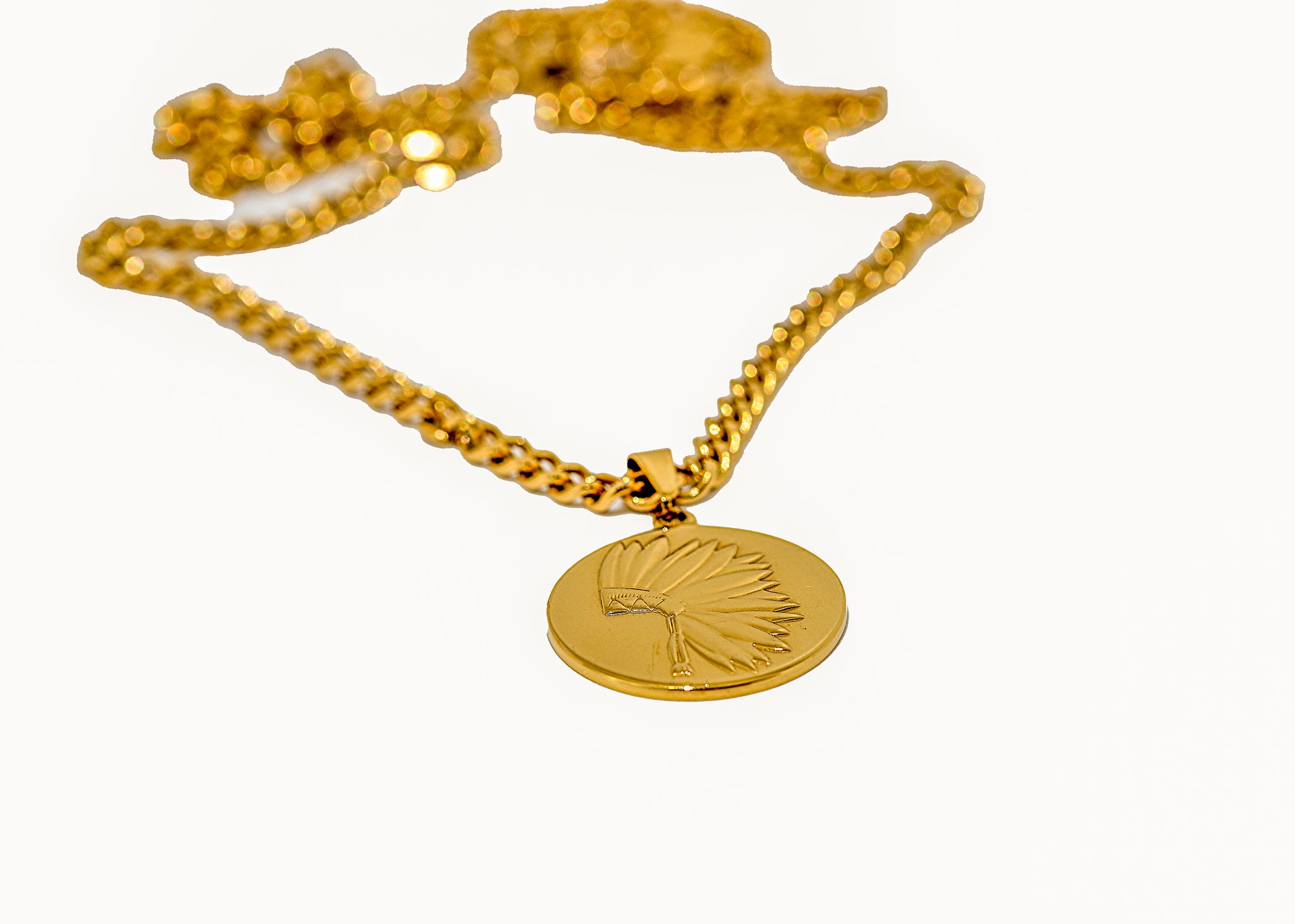 Gold chief necklace close-up showing chain